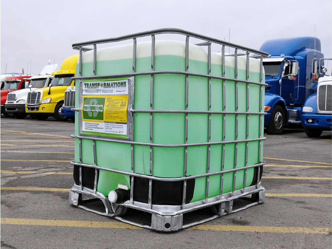 Recycled windshield washer fluid container produced from recovered liquid beverage waste